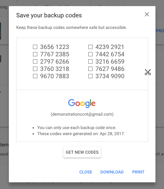 A photo of backup codes in a Google account. It reads, "Save your backup codes" and shows ten 8-digit numeric codes.