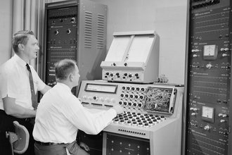 Two men at a computer