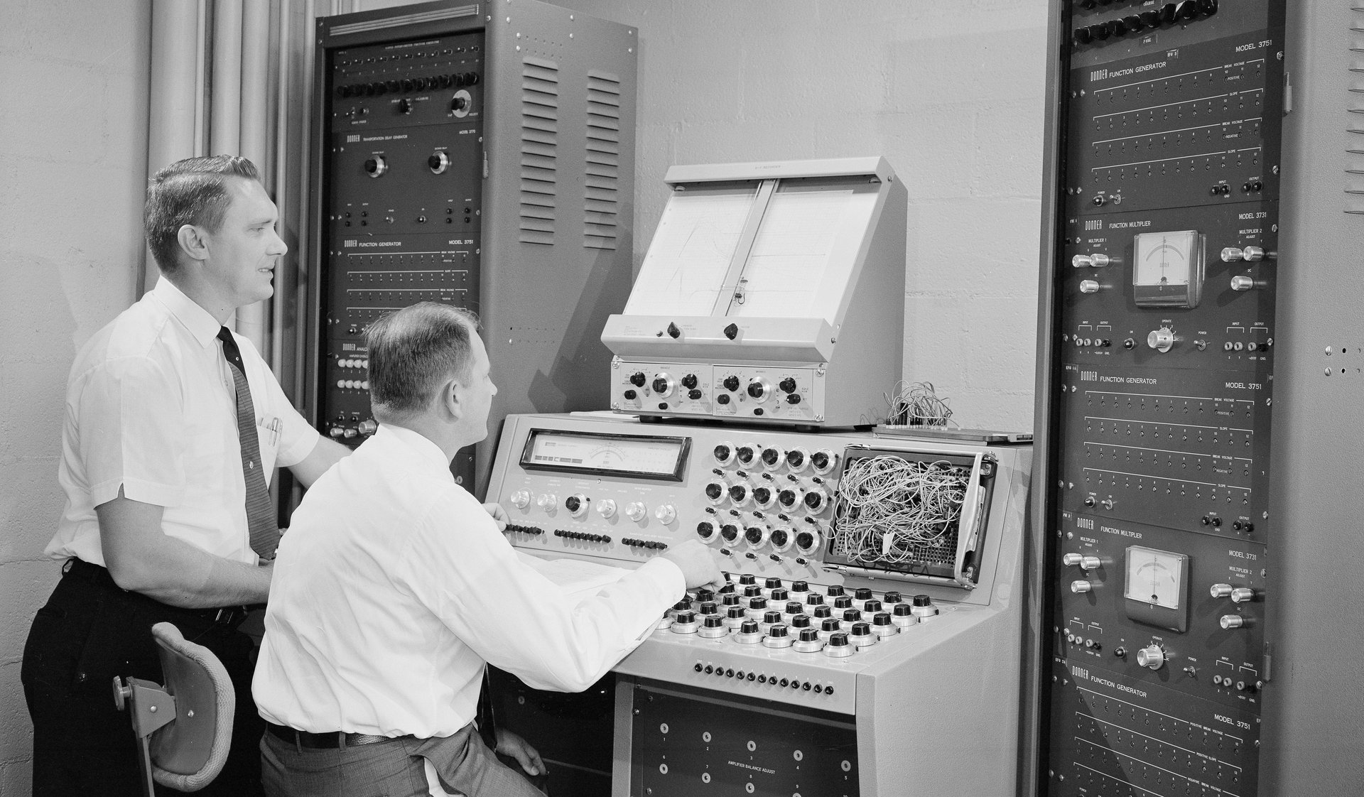 Two men at a computer
