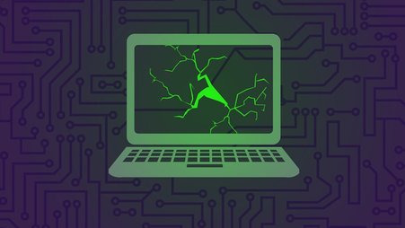 A green laptop with a cracked screen against a black background.