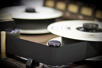 Header image, a close-up shot of recording equipment.