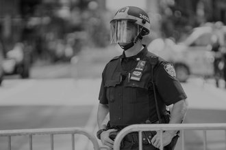 NYPD officer in riot gear