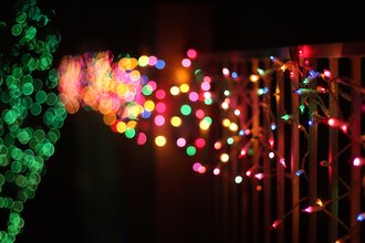 Header image with blurred holiday lights