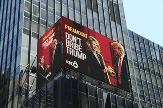 A billboard in New York City’s Times Square urging Paramount Global not to settle Trump’s frivolous lawsuit to grease the wheels for its merger.