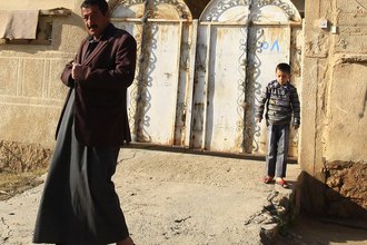 Aws Fahmy, 45, left, who was injured in the U.S. Marines raid in Haditha in 2005 and Omer Chasib, right, who lost his father in the same attack stand at the scene in Haditha, Iraq, Tuesday, Jan. 24, 2012