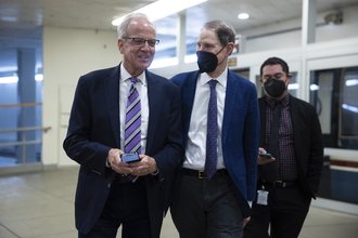 Sen. Jerry Moran, at left, with Sen. Ron Wyden at the U.S. Capitol in 2022