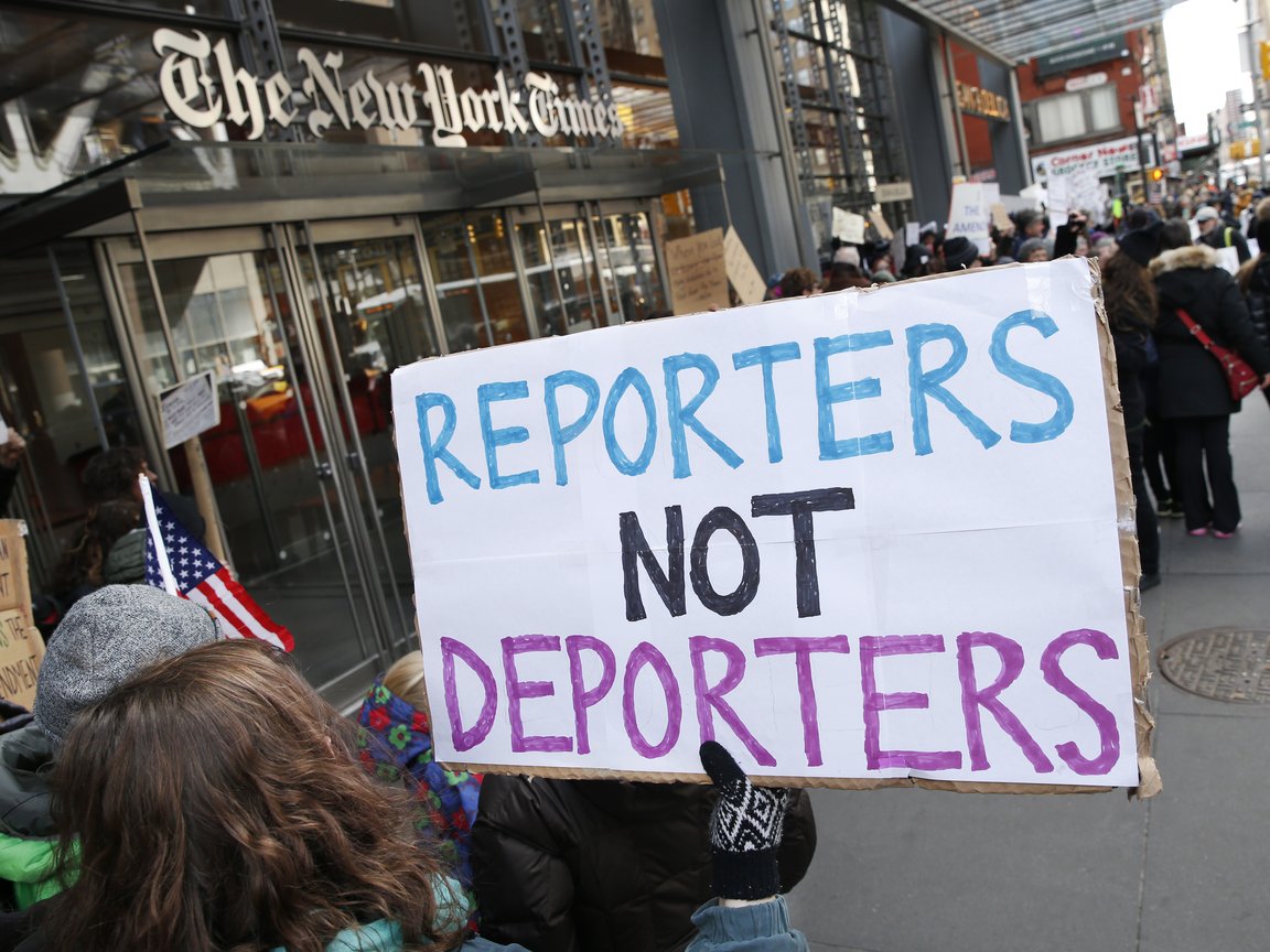 Protesters in front of The New York Times building, Sunday, Feb. 26, 2017, in New York