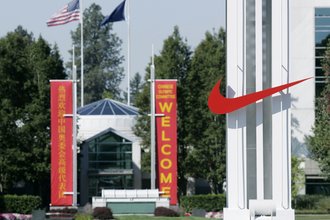 The red Nike swoosh marks the entrance to the company‘s headquarters campus in Beaverton, Oregon.