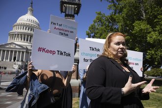 Content creators demonstrate in front of the U.S Capitol in 2024 in opposition to proposed legislation banning TikTok.