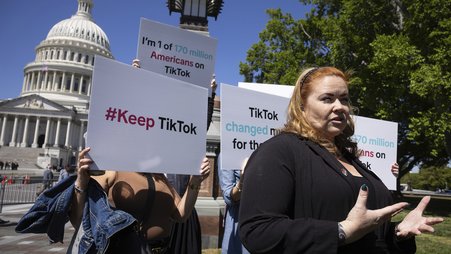 Content creators demonstrate in front of the U.S Capitol in 2024 in opposition to proposed legislation banning TikTok.