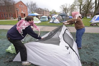 Tufts University students set up a tent on the campus of the school in April 2024 in Medford, Massachusetts.
