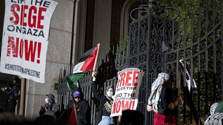 Protesters gather near a main gate at Columbia University in New York City in April 2024.