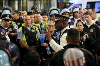 Chicago Police Superintendent Larry Snelling talks to officers after demonstrations near the Israeli Consulate during the Democratic National Convention in August.