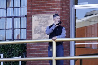 Guard stands outside the Huntsville Unit of the Texas State Penitentiary in 2024.