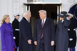 Donald Trump talks with then-President Joe Biden upon Trump’s arrival at the White House on Jan. 20, 2025