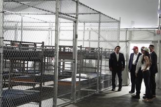 President Donald Trump, Gov. Ron DeSantis, and then Homeland Security Secretary Kristi Noem tour "Alligator Alcatraz," a migrant detention facility, on July 1, 2025, in Ochopee, Florida.