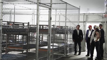 President Donald Trump, Gov. Ron DeSantis, and then Homeland Security Secretary Kristi Noem tour "Alligator Alcatraz," a migrant detention facility, on July 1, 2025, in Ochopee, Florida.