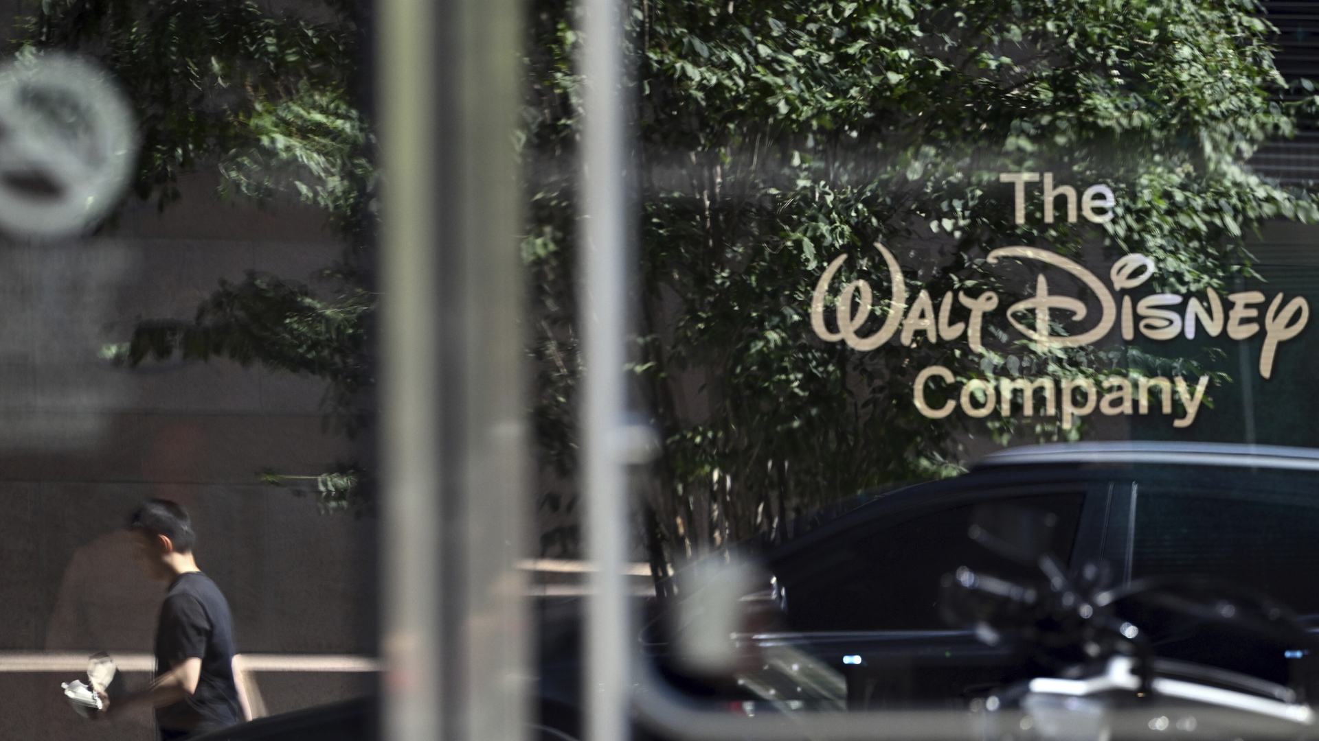 The Walt Disney Company logo displayed on a glass window at the ABC Network's Corporate Headquarters in New York, New York, in September 2025.