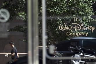 The Walt Disney Company logo displayed on a glass window at the ABC Network's Corporate Headquarters in New York, New York, in September 2025.