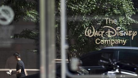 The Walt Disney Company logo displayed on a glass window at the ABC Network's Corporate Headquarters in New York, New York, in September 2025.
