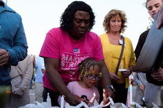 A vigil following the September mass shooting at The Church of Jesus Christ of Latter-day Saints in Grand Blanc Township, Michigan.