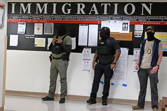 Masked federal agents at Immigration Court at 26 Federal Plaza in New York City