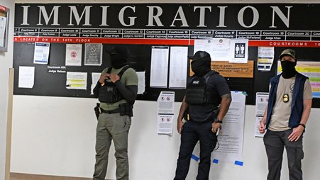 Masked federal agents at Immigration Court at 26 Federal Plaza in New York City
