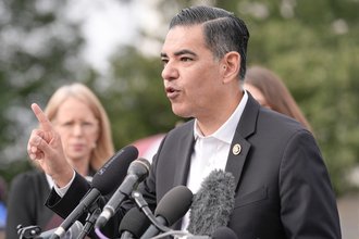 Rep. Robert Garcia speaks at a news conference.