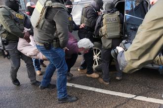 ICE agents arrest a protestor in Minneapolis