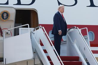 President Donald Trump boards the newly designated Air Force One, a formerly Qatari-owned jumbo jet, at Joint Base Andrews, Md., on July 1, 2026