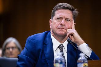 Jay Clayton testifies during his Senate Select Intelligence Committee confirmation hearing for the role of director of national intelligence on July 15, 2026.