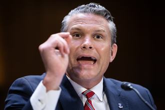 Defense Secretary Pete Hegseth testifies at a Senate Appropriations Committee hearing on July 21, 2026, in Washington, D.C., holding his thumb and pointer finger together.
