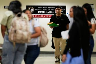 People arrive for immigration court hearings in New York.