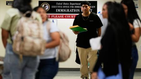 People arrive for immigration court hearings in New York.
