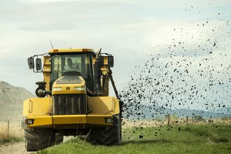 Adam Davis fertilizes a field with bio-solids near Corrine, Utah, in 2014