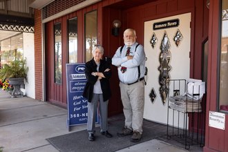 Atmore News publisher Sherry Digmon, at left, and journalist Don Fletcher, right