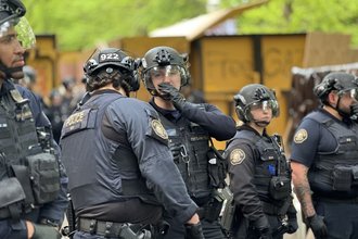 Portland Police Bureau officers preparing to advance on protesters at Portland State University