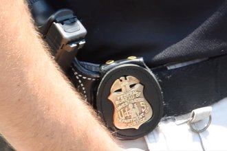 Badge on FBI agent