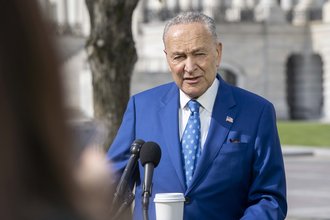 Senate Majority Leader Chuck Schumer at a press conference