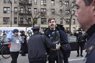 Journalist Reed Dunlea is arrested at a protest in Brooklyn