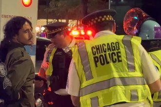 Independent photojournalist Josh Pacheco being arrested in Chicago during a protest of the Democratic National Convention in August 2024
