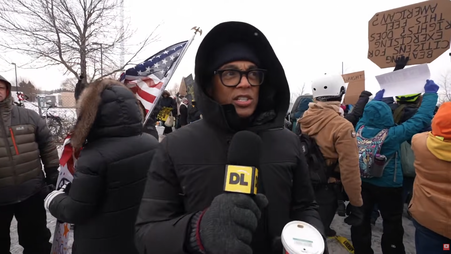 Journalist Don Lemon covering a protest at Minnesota church service on Jan. 18.