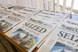Marion County Record newspapers with headline "Seized... but not silenced"