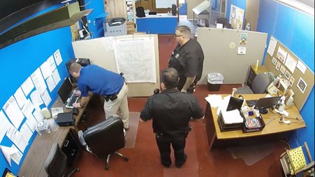 Screenshot from surveillance video taken from Marion, Kansas County police raid on the Marion County Record newsroom.