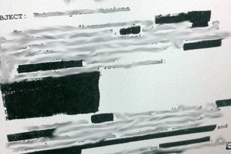 A document with the word "Subject" and then additional text that is blurred or blacked out