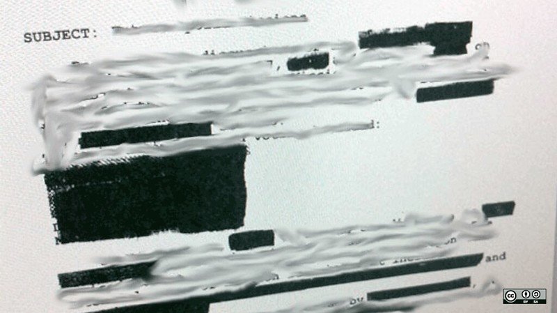 A document with the word "Subject" and then additional text that is blurred or blacked out