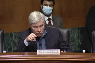 Senator Sheldon Whitehouse poses a question at the Senate Judiciary Committee hearing on FOIA