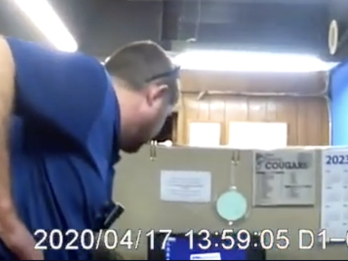 Screenshot from body camera footage of Marion County Record raid