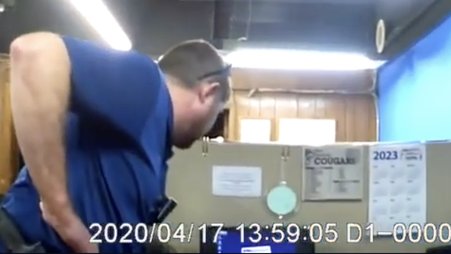 Screenshot from body camera footage of Marion County Record raid