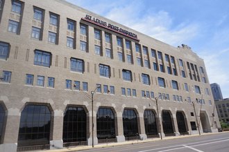 A brick building with the words "St. Louis Post-Dispatch" at the top